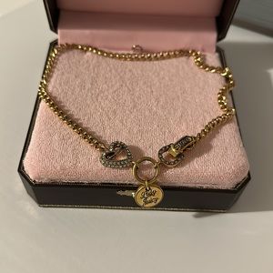 Juicy Couture necklace.